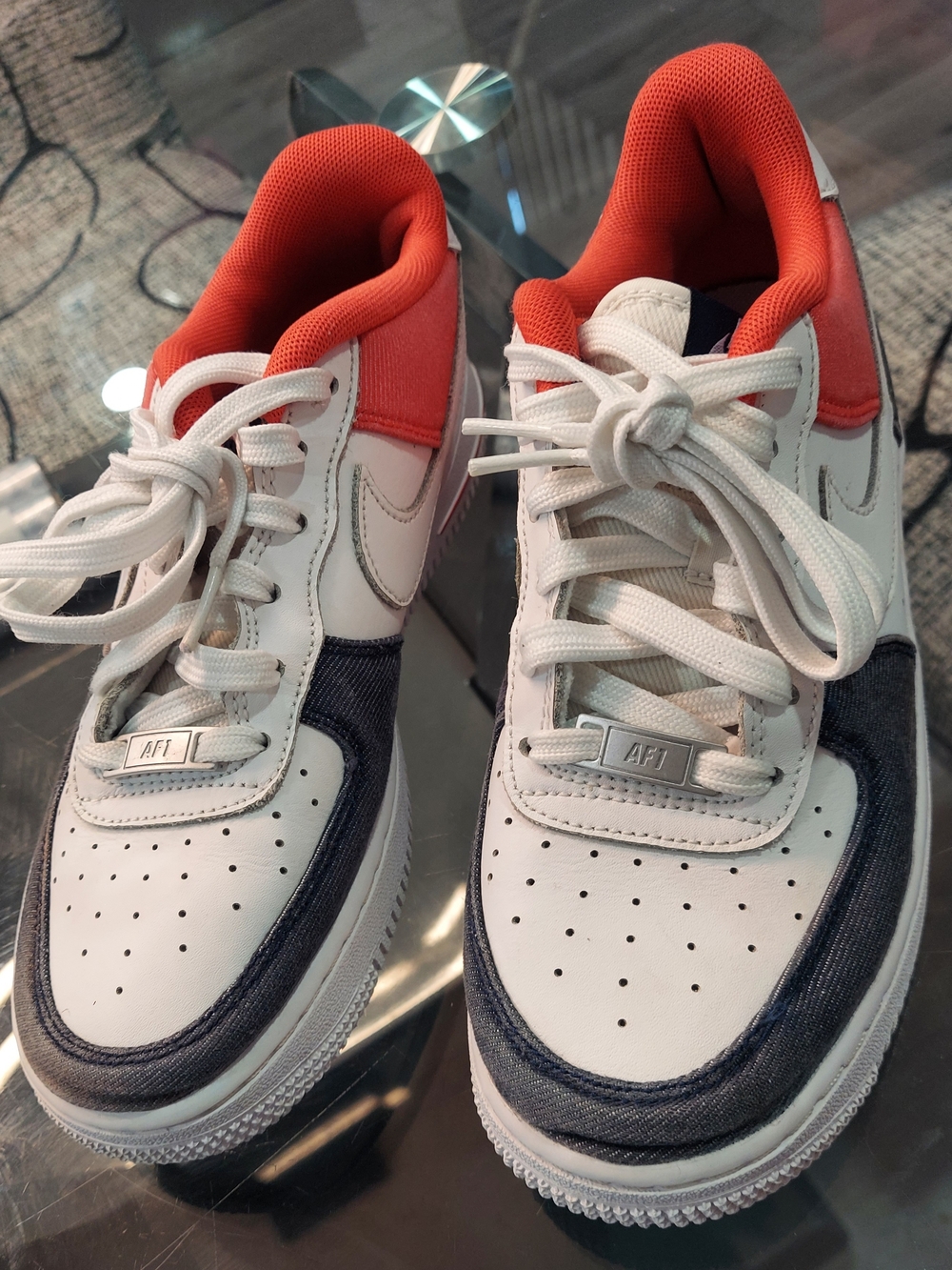 Nike White Low-Top Sneakers with Orange Lining and Navy Overlays